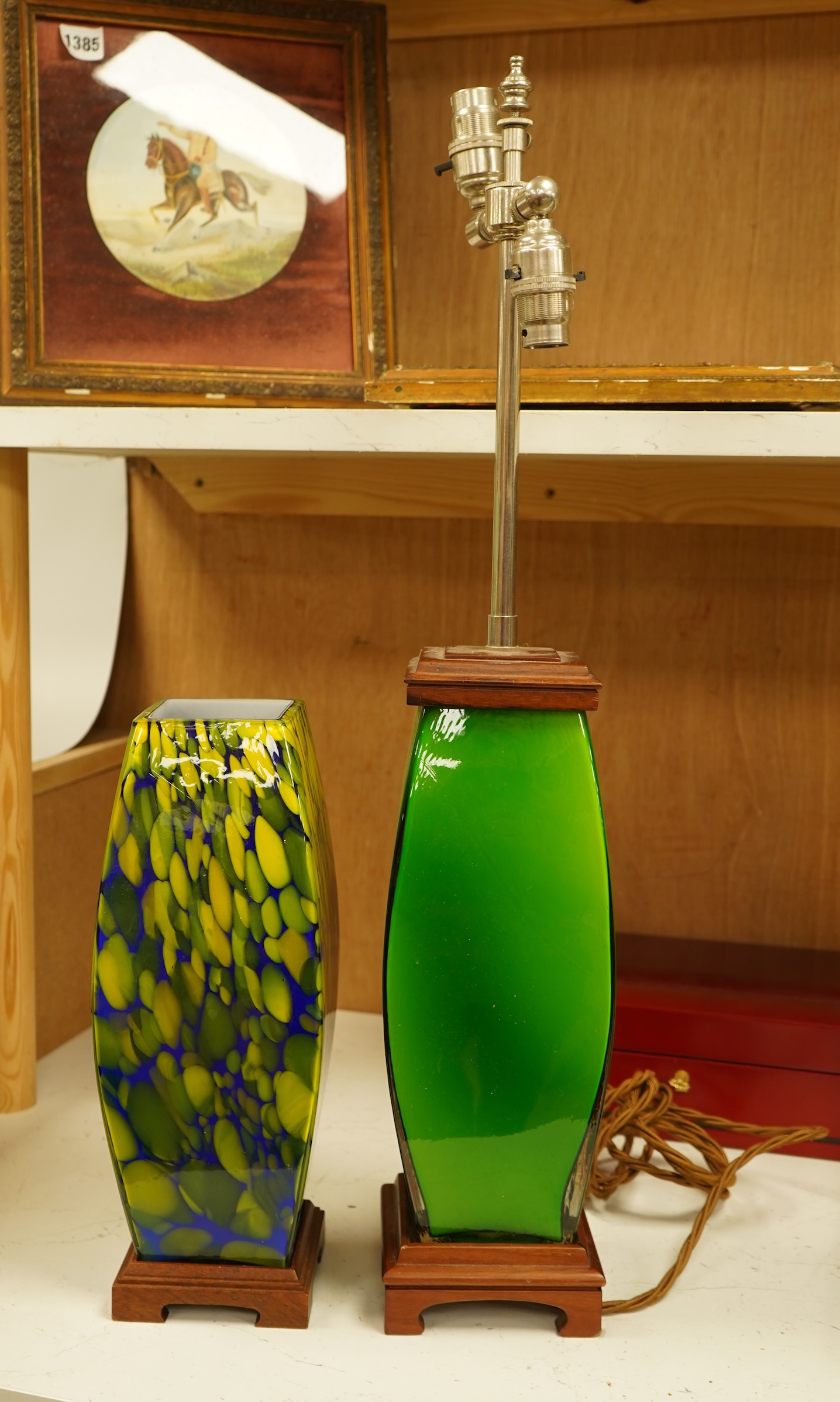A modernist green glass lamp base another another example, largest 66cm high